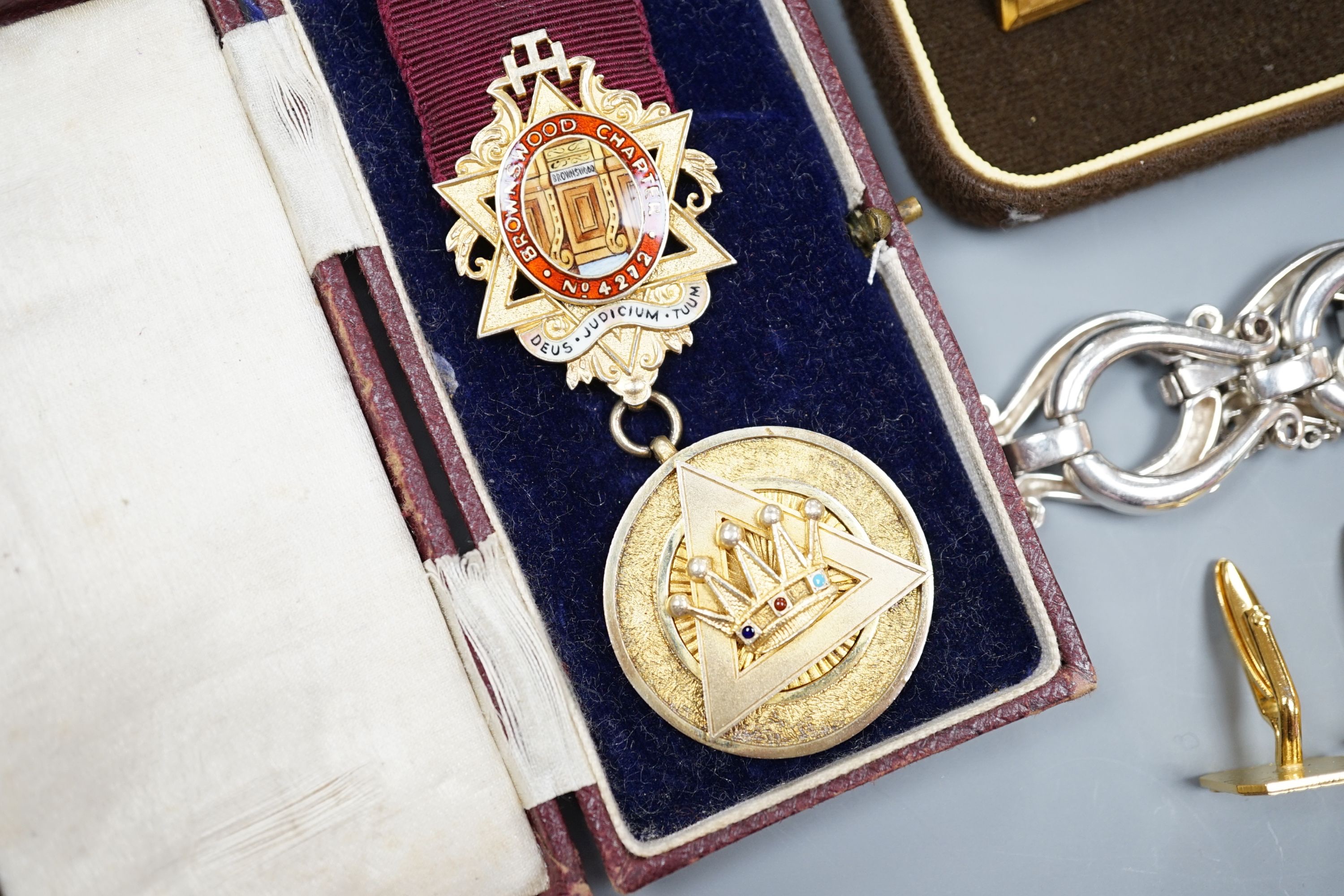 A white metal bracelet and minor jewellery and coins.